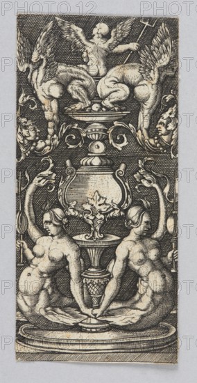 Ornamental panel, Claesz. Allaert graphic artist, mermaids mythology, ornaments, Dzialynska, Izabella née Czartoryska 1830-1899, fantasy creatures, decorations, putti iconography, winged putti iconography, vases, fantasy figures, tridents, 16th century, graphic print, height 8.5 cm, width 4 cm, The image shows a vertical engraved design in black and beige tones on a light gray background, featuring a symmetrical ornamental composition with a central large vase or urn flanked by decorative scrolls and foliage. Above the urn sits a figure with wings and an animal-like lower body, and a cherubic figure with wings is positioned at the top center. On each side of the urn a winged creature or decorative term with a human face is visible. Below the urn two seated nude female figures face outward, each holding a tall torch-like object, their hair styled and their bodies rendered with cross-hatched shading. The lower area includes a circular base or pedestal with layered moldings, and the entir...