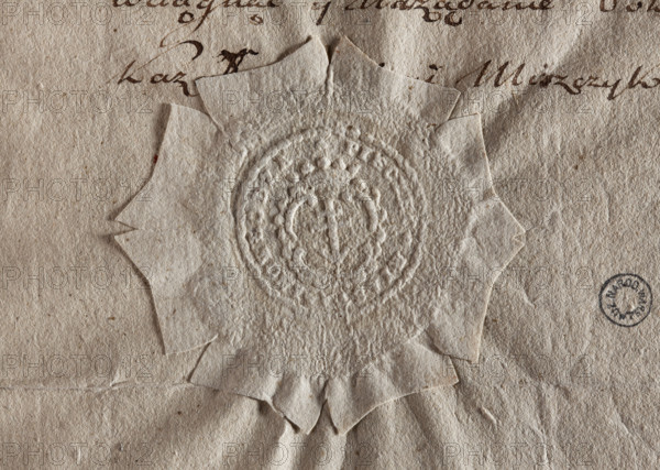 Round seal impression of the town of Inowlódz, Leczyca Voivodeship. In a decorative cartouche the Lis (coat of arms) reversed. Around the rim an inscription: PIECZEC. MIASTA. INOWLODZIA. 1788. Poland. Seal.