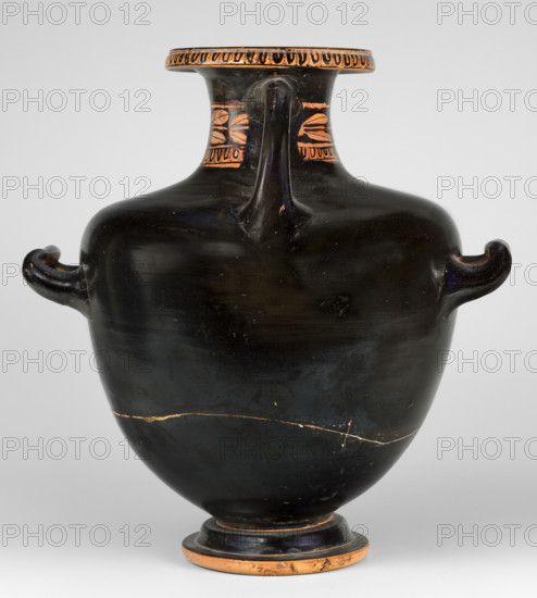 Red-figure hydria by the Amycus Painter, c. 420–400 BC (previously dated 420–410 BC). Greek red-figure hydria on a high profiled foot; the belly widens evenly toward broad, slightly sloping shoulders and a neck terminating in a wide profiled rim. The neck is decorated with an ovoid at the base and a band of leaves above; the ovoid also surrounds the rim edge. Figurative scene on the belly and shoulders above a meander band: a naked youth seated on a rock at center; a man in profile turns back, leaning on a rock with his right hand and resting his left hand on his left knee. The slender, muscular ephebe is flanked by two women in lavish robes — the woman at his left holds a mirror whose reflection the youth gazes into; the woman at his right holds a long branch topped with leaves in her right hand. Lucanian hydria, weight 2.056 kg.