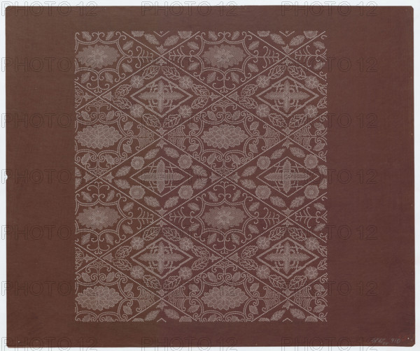 Ise katagami dyeing stencil (kôshi) with chrysanthemums and geometric patterns; maker: Ôsugi, Ishimi (1936- ); motifs: chrysanthemums, geometric and plant patterns; Japanese, Showa period (1926–1989), 1980 (Showa 55); stencil; height 45.0 cm, width 53.9 cm., The image shows a square sheet with a wide brown border and a central patterned panel in a darker brown shade featuring an intricate repeating geometric and floral motif made of small pale dots, forming diamond shapes, stylized leaves, rounded floral medallions, and curving scrollwork; the dotted pattern creates a lattice-like grid across the central area, with the border area remaining solid brown.