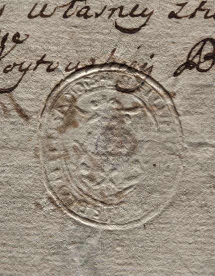 Oval seal impression of the town of Blonie, Masovian Voivodeship. On the decorative shield is the Godziemba coat of arms. Illegible inscription on the rim. 1779. Seal, dimensions 1: 31.5 mm; dimensions 2: 35.5 mm.
