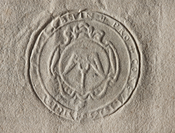 Round seal impression of the town of Bnin, Kalisz Voivodeship, Pysdry County. In a baroque cartouche, the combined coats of arms of Lodzia and Jasienczyk (a key is placed on the boat). In the rim, the inscription: +SIGILLUM + BNIN + PRO + CONSULIS 1656. 1656, Poland.