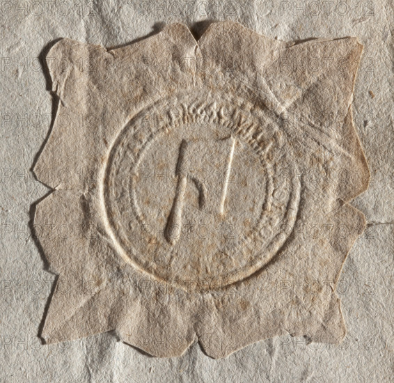 Round seal impression of the town of Bobrowniki, Stezyca region. The Topór (Axe) coat of arms is on the pearl rim. The inscription on the rim is illegible. CIVITA, 1664. Poland. Seal.