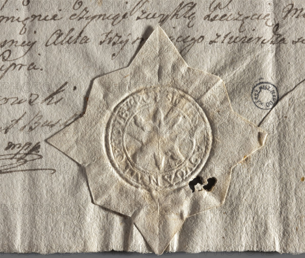 Round seal impression of the town of Busko, Sandomierz Voivodeship, Wislica County. A sun with eight rays. In the rim an inscription: 'SIGILUM. ADVO. ANALE. OPPIDU BUSKO.' Dated 1774. Poland. Seal. Maker: Zurakowski, Witold (?-1927).