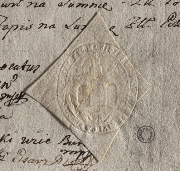 Oval seal impression of the town of Checiny. Wall with three arcades; above the central arcade a vase of flowers; under the wall a shell. Inscription around the rim: 'SIGILLUM, SAC. REGN., 1777'. Seal, Poland; dimensions 39.5 mm and 45 mm.