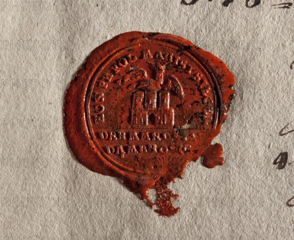 Round wax impression of the town seal of Dombrowice (Dabrowice). In the upper field a wall with an open gate; behind it three towers, on the towers a Prussian eagle with spread wings. In a semicircle the inscription: KON PR POL MAGIST SIEGEL. In the lower field: DERMMED, // DAMBROVIC., 1803. Round wax stamp/seal.