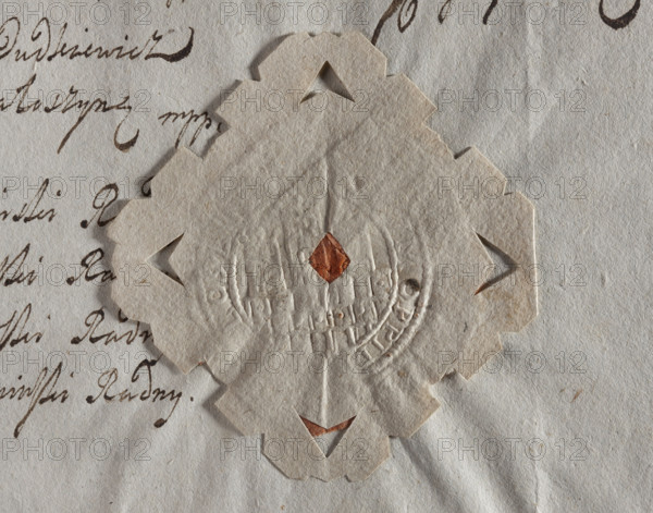 Round seal impression of the town of Dzialoszyn, Sieradz Voivodeship. Wall with three towers - Grzymala coat of arms. Illegible inscription on the rim. 1779, Poland. City seal; seals with architectural structures; official/document seal; round seal impression.