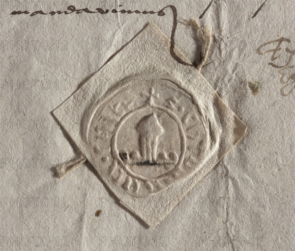 Horodlo city seal. Round seal impression showing what appears to be a mitre attached by three ribbons to a base with four projections. Inscription on the rim is illegible. 1566, Poland.
