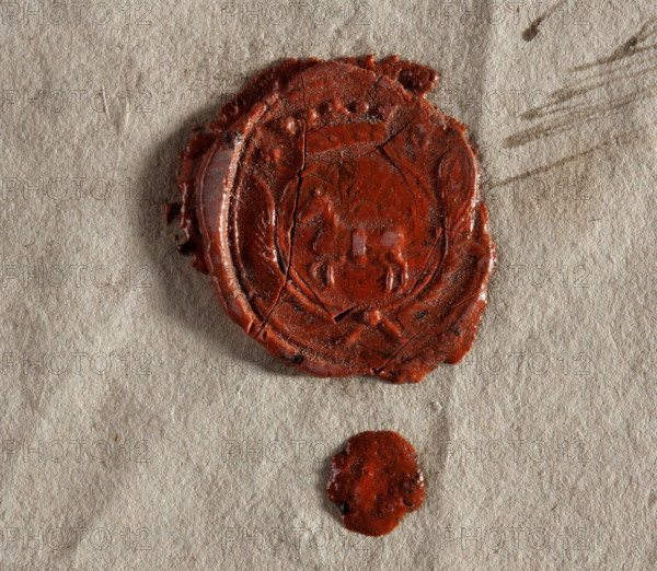 City seal of the town of Granica. Document issued jointly by two towns: Gniewoszów and Granica and bearing the seals of these towns. Oval wax impression of the seal of the town of Granica, Sandomierz Voivodeship, Radom County. On a round crowned shield surrounded by palm branches, the Starykon coat of arms (coat of arms of the Wielopolski family). On the sides the letters MG (town Granica), 1781. Stamp. Dimensions: 21 mm and 24.5 mm.