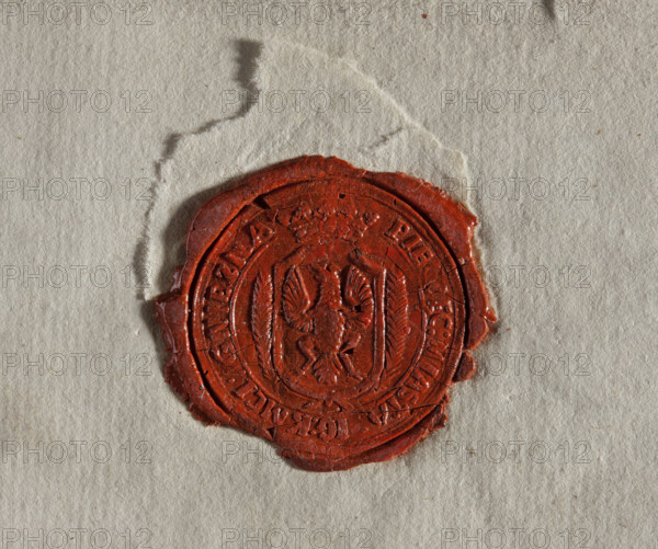 Round wax impression of the seal of the city of Gniezno. On the crowned shield a single-headed eagle. The shield is surrounded by palm branches. Inscription on the rim: SEAL: CITIES IG: K . MCI: GNIEZNA. 1790, Poland.