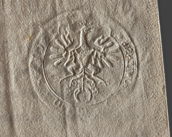 Round seal impression of the town of Grzybowo, Masovian Voivodeship. Single-headed crowned eagle with a split tail; in the split tail the coat of arms of Prus III. Inscribed around the rim: * SIGI, UM . O, BUWIENSIS, 1777. Poland.