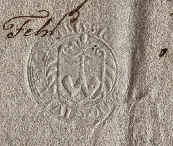 Round seal impression of the town of Ilza. On the baroque shield the Abdank coat of arms with a cross. Inscription around the rim: SIG. ABINO. CIVITATI. ILZENSIS. 1777. Poland. Seal. WQXBCFS