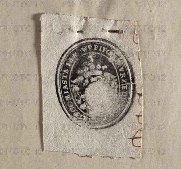Oval print of the seal of Janów. In the oval cartouche, the Jelita coat of arms with a jewel above the crown, under the crown a labry. In the rim, the inscription: *SEAL OF THE WOYTOWSKI OFFICE OF THE CITY OF IANOW*, 1790. Poland; seal; dimensions 1: 37 mm; dimensions 2: 43 mm.