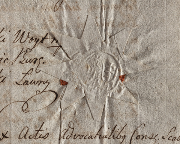 Round seal impression of the town of Józefów, Lublin Voivodeship, Urzedów County. On the wall (Prawdzic coat of arms) half a lion holding a shield with the Pilawa coat of arms. Illegible inscription on the rim. 1773, Poland.