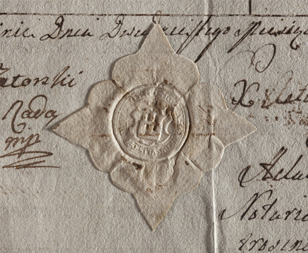 Round seal impression of the town of Jutroszyn, Kalisz Voivodeship. On the shield there is a wall with two windows and three battlemented towers, the middle tower higher. In the rim: SIGILLUM PROCONSULIS OPIDI IVTROSIN, 1699. Poland.
