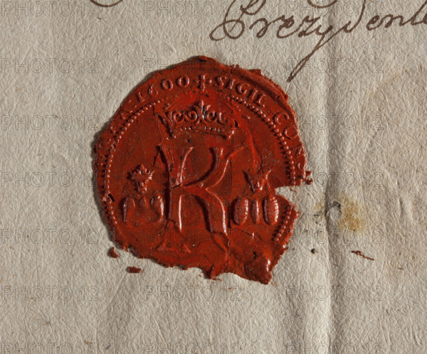 Round wax impression of the seal of Kazimierz — a suburb of Kraków. Under the royal crown the letter K, on the sides two busts of Casimir the Great. In the rim the inscription: + SIGIL CONS, CRA : 1600 +. Dated 1600, Poland.