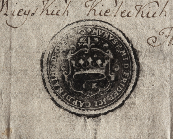 Round ink print of the seal of the city of Kielce. On the decorative shield a crown; under it the letters CK. In the rim an inscription: + MUNUS RMTD FRIDERICI CARDINALIS D, ., 1792. Poland. Seal.