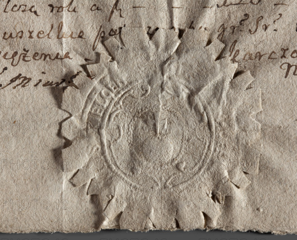 Round seal impression of the city of Kielce. On a baroque shield in a pearl-shaped rim — the world — a royal orb. Illegible inscription in the rim. 1778. Poland. Seal. WQXBCFS