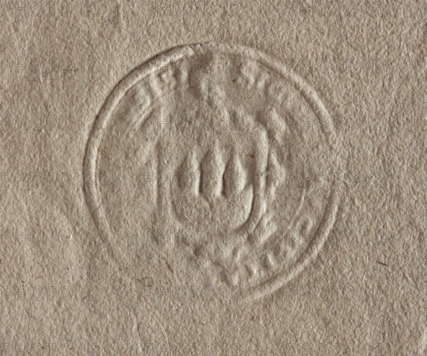 Round seal impression of the town of Kobylin, Poznan Voivodeship. On the decorative shield behind the wall there are three towers with pointed roofs topped with balls. Illegible inscription on the rim. 1780, Poland, seal