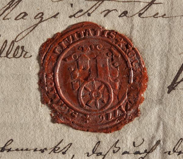 Round wax impression of the seal of the town of Kolo, Kalisz Voivodeship. On the circle there is a decorative shield bearing two towers with pointed roofs. In the rim there is an inscription: *SIGILLUM* CIVITATIS* KOLE, 1776. Poland.