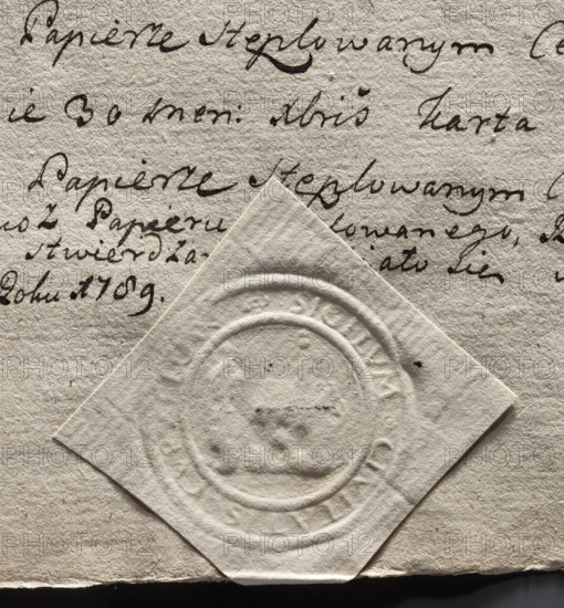 Round seal impression of the town of Kurzelów, Sandomierz Voivodeship, Checiny County. Probable image of a church building with a bell tower. Inscription around the rim: SIGILUM . CIVITATIS . CURZELOW. Dated 1789, Poland.
