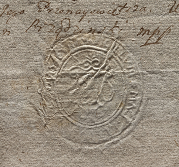 Oval imprint of the seal of the town of Luków, Podlaskie Voivodeship. Illegible drawing in the decorative cartouche. Illegible inscription around the rim: SIGILLUM MAGI... 1777. Seal attached to documents; stamp. Dimensions: 42.5 mm and 48 mm. Maker: Zurakowski, Witold (?-1927).