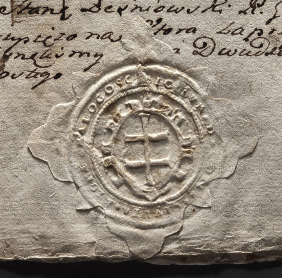 Round seal impression of the town of Malogoszcz. In a decorative cartouche, a double cross — the dynastic sign of the Jagiellonian dynasty. In the rim, the inscription: *SIGILUM * D * CONS * CIVITA *, * MALOGOSC *, 1775. Poland.