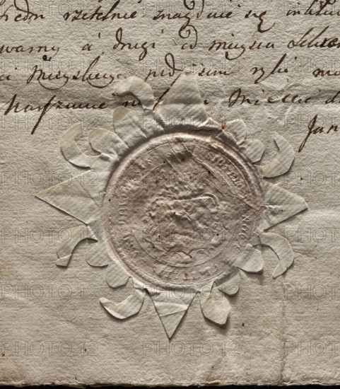 Round seal impression of Warsaw - Nowe Miasto. Richly decorated shield with illegible coat of arms. In the rim the inscription 'SIGILLUM * NOVAE * CIVITATIS * VARSOVIS.', dated 1777, Poland.