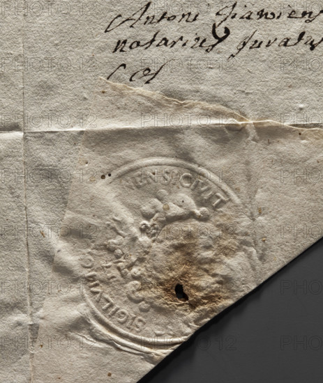 Round seal impression of the city of Olsztyn. On a round, richly decorated, crowned shield, an illegible drawing of St. James with a pilgrim's staff. Above the crown, the date 17__. On the rim, a partially illegible inscription: + SIGILLUM CI[N] NENSTEIN, 1777. Poland.