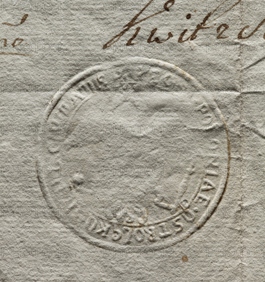 Round seal impression of the town of Ostroleka, poorly legible. Eagle holding a scepter and an orb in its talons. In the rim the inscription: CIVITATIS REG. POLONIAE. OSTROLEK. 1777. Seal, Poland.