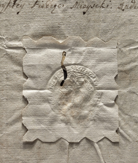 Round seal impression of the town of Ozarów, Sandomierz Voivodeship; city seal of Ozarów with coat of arms; round document seal; rim inscription and internal drawing illegible; 1778; maker: Zurakowski, Witold (?-1927); Poland; seals, official seals.