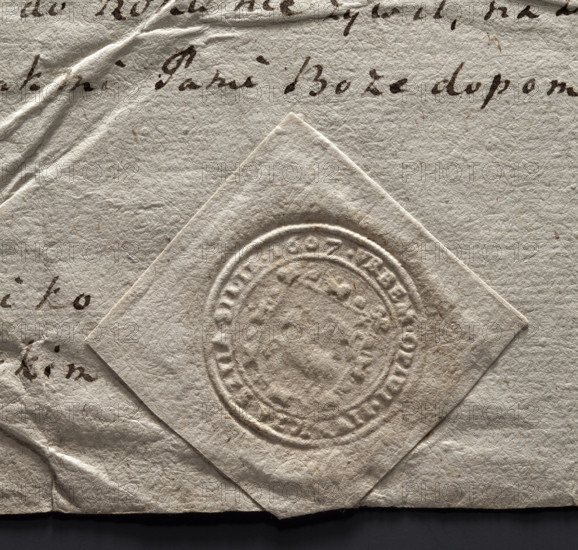 Round seal impression of the town of Piwniczna. On a baroque shield, a lamb turned to the right, with a flag. Inscription around the rim: . VRBEM . OPIDI . PIWNICZA . SZ. 1607. Poland.