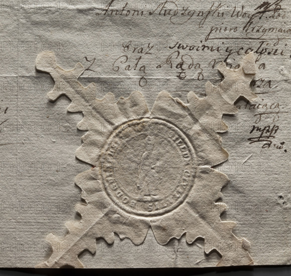 Round seal impression of the town of Podgórz. In the field of the seal, a standing figure of a bishop in a miter with a crosier in his left hand and three crutches in his right hand (St. Nicholas?). Around the rim, an inscription: SIGILLUM CIVITATIS PODG, ENSIS, 1606. Poland.