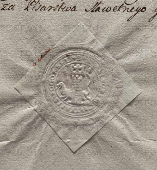 Circular imprint of the town of Pogorzela. Tower with a gate and three battlements; behind it, a lion with a long tail turned to the right. In the rim a partially illegible inscription: + SI, CIVITATIS . POGORZELA +, 1774. Seal, Poland.