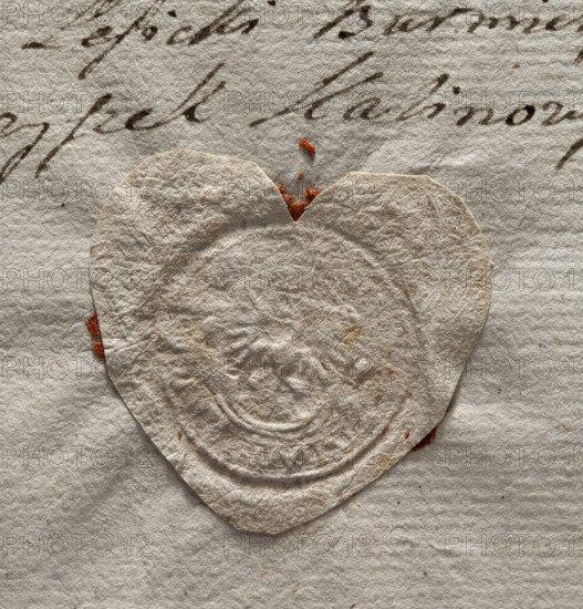 Round imprint of the municipal seal of Polaniec, Poland (1778). Depicts a royal eagle standing, holding a horn in its talons. Illegible inscription on the rim. Designed by Zurakowski, Witold (?-1927). Seal attached to a document; state civic seal. Culture, visual documentation 2014/2015.