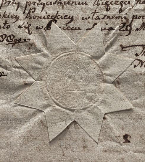 Round seal of the town of Poniec. In the field of the seal, two towers covered with conical roofs. One window in each tower. Between the towers, at the height of the roofs, a star. Illegible inscription on the rim. 1788, Poland.