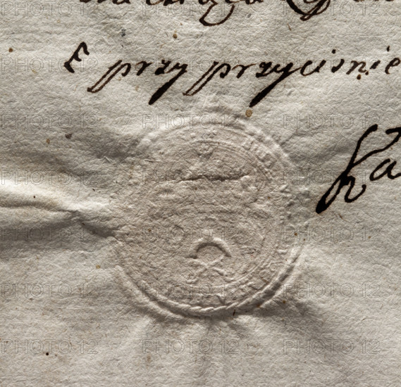 Round imprint of the seal of the town of Praga near Warsaw. The upper part of the drawing is illegible. Image of Our Lady of Loreto in the clouds above a ribbon held by angels. In the lower part of the field, a cartouche with the Ogonczyk coat of arms. Below, two crossed keys as a symbol of St. Peter and Paul, the patrons of the diocese. Illegible inscription around the rim (SIGILLVM ADVOCATIALE CIVITATIS PRAGENSIS). 1778, Poland, seal.