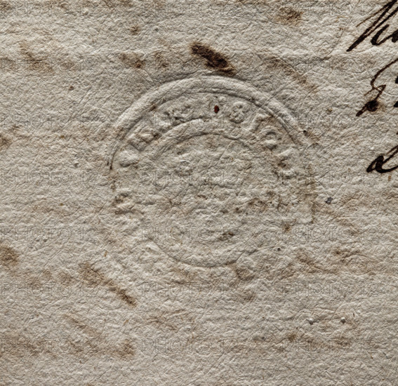 Round wax seal impression of the town of Skaryszew, Sandomierz Voivodeship, Radom County. In a Baroque cartouche, probably a double cross. Rim bears illegible inscription starting SIGIL, ADVOCAT, CIVIT, SKARZI. Broken impression from sealing a letter; only the cross is visible. 1778, Poland.
