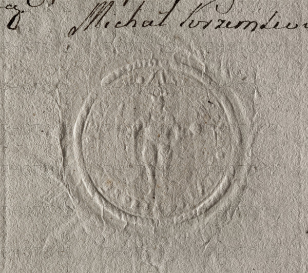 Round seal impression of the town of Skaryszew near Warsaw. In the central field, a knight in armor, standing. In his right hand he holds a royal orb; the left hand is invisible. Illegible inscription on the rim. 1777, Poland.