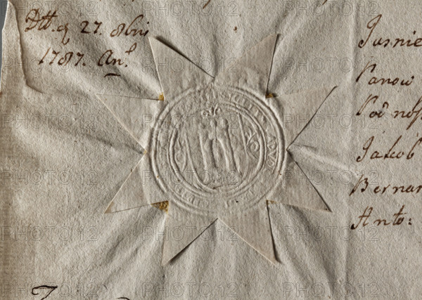 Round seal impression of the town of Stawiszyn. In the decorative cartouche, a tower with a large gate topped with spheres. In the rim, the inscription: SIGILLUM . ADVOC, ALI OPPID, STA, 1787. Poland. Seal.