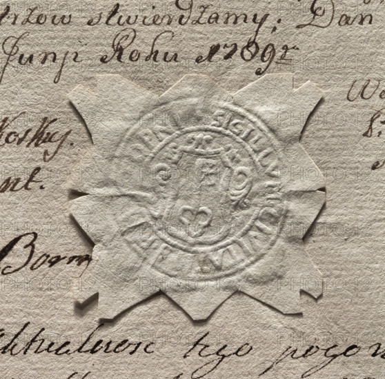 Round imprint of the seal of the town of Stopnica. In a decorative cartouche a key - tooth up. Around the rim is the inscription: *SIGILLUM . CIVITATIS S . R ., ., OPNI*. Oval imprint of the private seal of the starost of Stopnica - wax. In the oval cartouche the Leliwa coat of arms; in the crest above a half-lion crown with a mirror in its paws. Behind the shield two swords, under the shield an order on a ribbon. 1789, Poland, seals attached to documents; round and oval imprints.