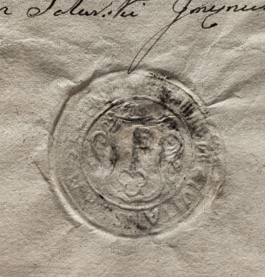 Round seal impression of the town of Stopnica. In a decorative cartouche, a key with its teeth up. Illegible inscription around the rim: M CIVITATIS ST, 1789, Poland.