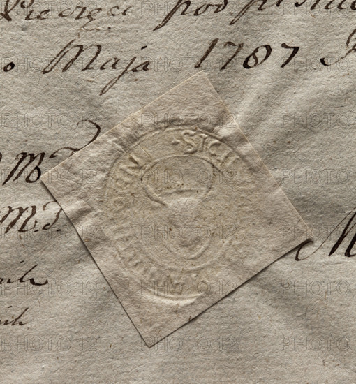 Oval impression of the seal of the town of Tykocin. On the shield there is a bison's head with horns protruding beyond the shield. In the rim there is an inscription: + SIGILUM, MA : N, TIKOCIN., 1787. Poland. Seal. Dimensions: 30.5 mm and 34 mm.