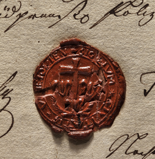 Round wax impression of the seal of the town of Uniejów. A cross standing on a lily, two palm branches beneath it, two lilies on the sides. Inscription around the rim: * SIG, LLUM * CIVITATIS * V, EIOVIEN *, 1802, Poland. Wax city seal of the town of Uniejów; town coat of arms; official seal used to attach to documents.