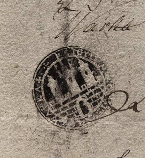 Round ink print of the seal of the town of Warka. City wall with an open gate and battlements. Three towers on the wall; the middle one is higher. Inscription around the rim: + SIGYLLUM, VARKA +, 1802, Poland. Seal; ink city seal; dry impression; seals attached to documents; official town coat of arms.