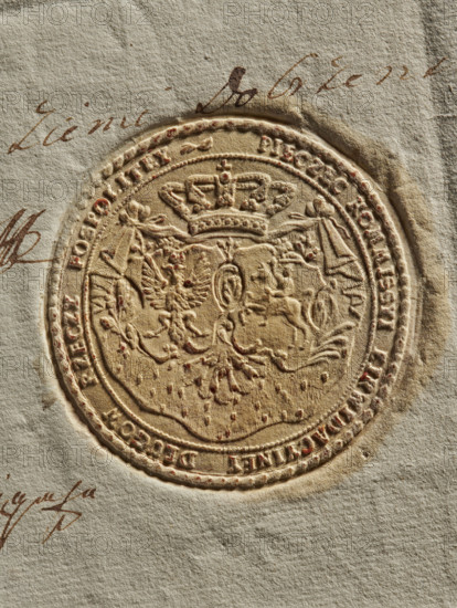 Round seal of the Debt Liquidation Commission of the Republic of Poland. On the ermine cloak, under the crown, two decorative cartouches with an Eagle and a Pogon. In the rim, the inscription: PIECZEC KOMMISSYI LIKWIDACYINEY DLUGOW RZECZY POSPOLITEY. 1777, Poland., A close-up of an embossed circular seal pressed into textured paper, showing a raised heraldic design with a crowned emblem, ornamental flourishes, and shield-like shapes; the seal and paper are primarily beige and tan with subtle darker brown and reddish-brown speckles and accents, and there is faint cursive handwriting in brown ink visible around the edges of the seal.