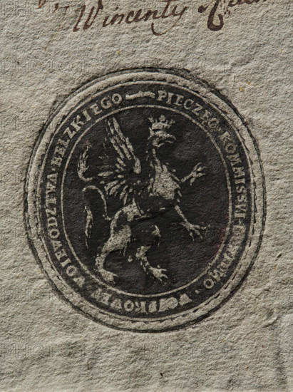Oval ink print of the seal of the Civil-Military Commission of the Belz Voivodeship. Griffin turned to the left. Inscription around the rim: SEAL OF THE CIVIL-MILIARY COMMISSION OF THE BELZ VOIVODESHIP, 1790, Poland., A textured off-white paper background with a dark circular stamp showing a winged creature with a crown inside the circle; the stamp appears in shades of black and dark gray with some lighter worn areas where the paper shows through, and there is a small area of faint reddish discoloration near the stamp edge; above the stamp there is a small area of brown ink scribble.