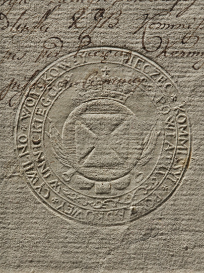 Seal of the Civil-Military Order Commission of Braclaw County. Round seal impression of the Civil-Military Order Commission of Winnica County. In a round crowned shield, the coat of arms of Braclaw County. Around the rim, the inscription: PIECZEC KOMMISSYI PORZADKOWEY CYWILNO WOYSKOWEY // POWIAT WINICKIEGO. 1790, Poland, seal., A textured beige paper surface with an embossed circular seal showing a crowned emblem in the center and decorative patterns around its rim, with several areas of darker brown ink handwriting visible behind and above the seal; overall colors include beige, light tan, and brown.