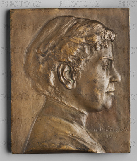 Head of a woman, Kazimierz Mieczyslaw Chodzinski (1861–1921). Obverse: head of a woman in right profile, slightly curly hair pinned up, covered at the back with a cap, high collar around the neck. 1913. Poland. Plaque. Dimensions: 63 mm and 76 mm.