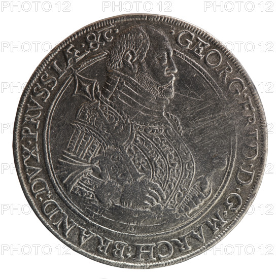 Thaler (Gulden), 1586. Obverse: half-figure of Jerzy Fryderyk (Duke of Karniów; 1539–1603) in armour, turned right, holding a sceptre in the right hand and left hand resting on a sword hilt; separated by a double inner border and rim; rim inscription GEORG, DDG MARCH BRAND DVX PRVSSIAE &C with crosses between words and ligature AE in PRVSSIAE. Reverse: in the field, left the Brandenburg eagle with the Hohenzollern coat of arms on its breast, right the Prussian eagle with a crowned letter S on its breast; below, in a lily-topped shield, value numeral 60; rim inscription SI DEVS PRO NOBIS QVIS NTRA NOS 1586 with rosettes between words and a mint mark between the date numerals. Ducal Prussia (1525–1701), Königsberg. Coin: diameter 36.9 mm, weight 24.64 g, axis 45°.
